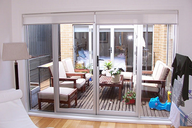 Installation of Aluminium French Double Doors With Sidelites in Melbourne